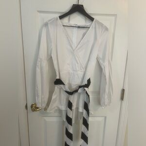 White high low poet sleeves shirt. 97% cotton 3% spandex. Brand new